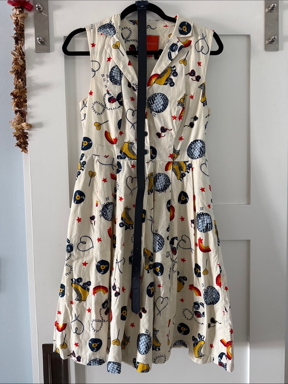 ModCloth White Sleeveless Fit-and-Flare Dress with Navy, Yellow and Red Motif - Picture 4 of 8